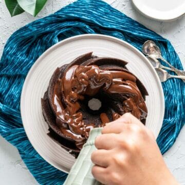 The cake is covered with the silky chocolate ganache.