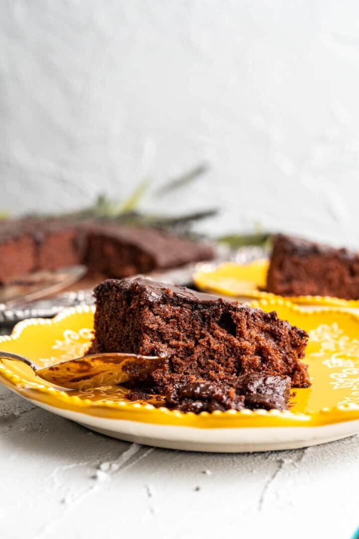 cake shot in a close up in a yellow plate.