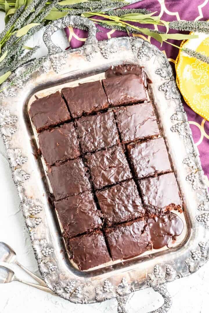 over the head shot of the cola chocolate cake in an antique tray.