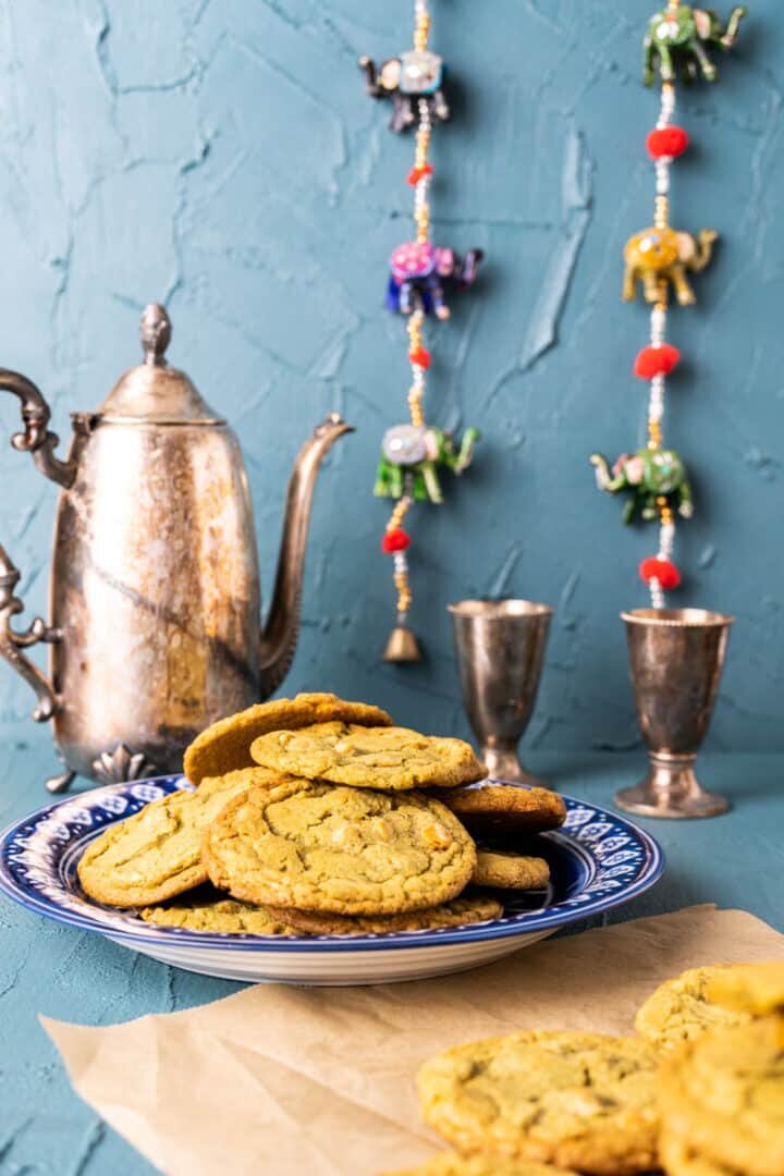 matcha cookies in a fancy blue plate.